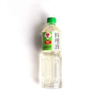 A bottle of Japanese cooking sake over a white background.